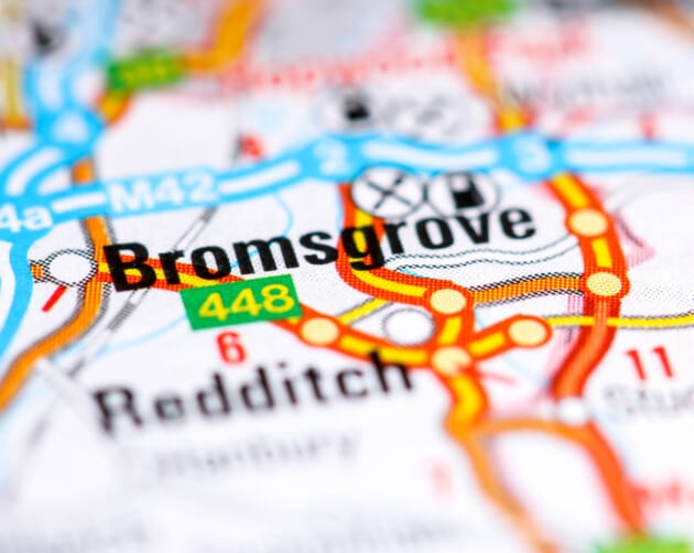 Close-up of a detailed map showing the roads and highways around Bromsgrove, highlighted in bold text. Nearby areas like Redditch are also visible, along with route numbers and road patterns. BDHT developments are prominently marked, offering insights into local infrastructure. ©Mobysoft